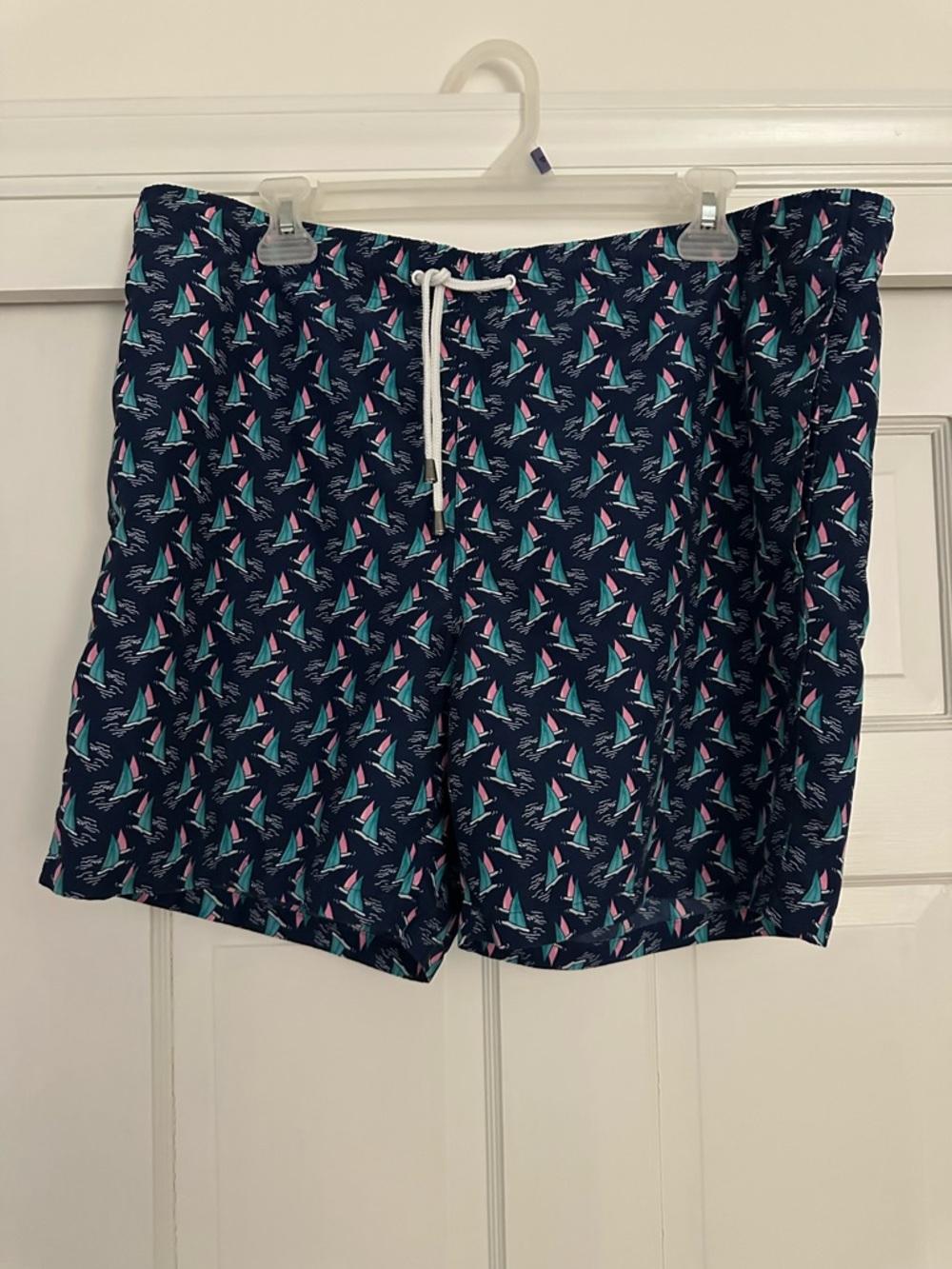 crown & ivy Navy Swim Shorts with Teal and Pink Sailboat Print